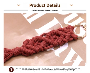 Close-up of handmade dark red woven keychain with intricate knotwork and cotton tassels