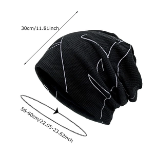 Fashionable black knitted slouchy beanie with white abstract pattern, 30cm height