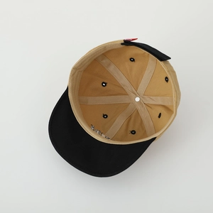 Internal detail of Florida kids baseball cap showing reinforced stitching and black sweatband