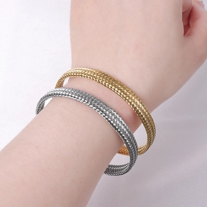 Chic gold and silver mesh woven C-shape stainless steel open bangles on model