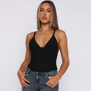 Detail view of the black slim-fit corset top with supportive boning and thin straps
