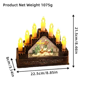 Christmas LED candle arch with Santa sleigh snow globe and wooden base decoration