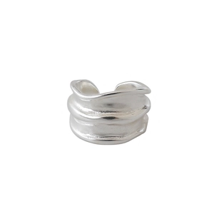 Minimalist S925 sterling silver ear cuff featuring irregular wave design in silver finish