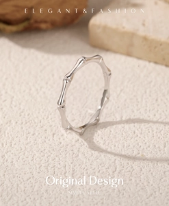 Macro view of minimalist S925 sterling silver ring with textured bamboo joint design