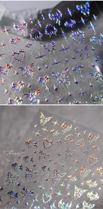 Detaillierte holografische Nagelaufkleber mit Schmetterlings- und Herzflammenmustern
