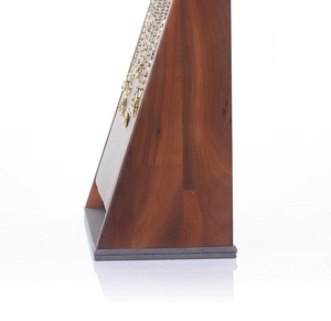 Side view of walnut wood necklace display stand with gray velvet lining details