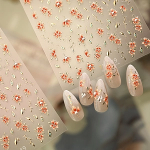 Vintage cherry blossom nail art sticker with gold leaf accents and embossed texture
