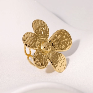 Minimalist gold flower ring with hammered texture and adjustable stainless steel band