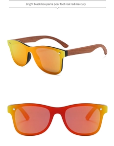 Detail of bamboo wood temples and red mercury polarized lenses on large frame sunglasses