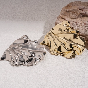 Irregular metallic pleated leaf brooches in gold and silver finish for suits