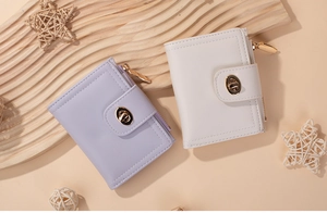 Short PU leather wallet for women with golden buckle and zipper in purple and white
