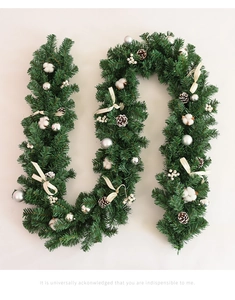 Detailed view of 2.7m Christmas garland with pine cones, cotton and silver ornaments
