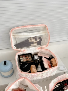 Pink bow quilted cosmetic bag with large capacity and mesh zipper compartment for brushes