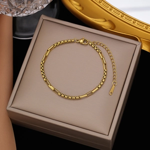 Detail of 18k gold plated stainless steel chain with lobster clasp and extender