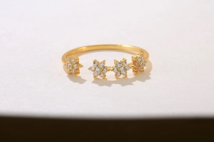 Macro shot of gold-plated S925 sterling silver snowflake ring with sparkling zircon stones