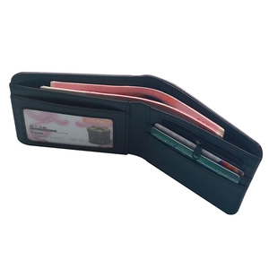 Men's black leather skull wallet featuring internal card slots and a zipped coin pocket