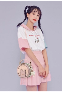 Detail of pink and white round crossbody bag with cute cat ear design and sequins