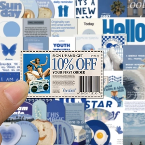 Macro shot of blue vintage aesthetic stickers for DIY scrapbooks and laptop decoration