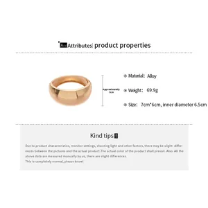 Polished gold alloy oval bangle detail with 69.9g weight and size specifications
