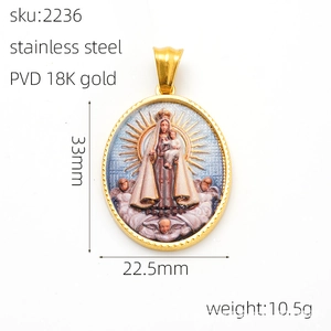 Macro detail of oval 18k gold plated Virgin Mary pendant with colorful enamel art