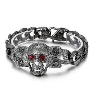 Vintage 304 stainless steel skull bracelet with red gems and distressed metal finish