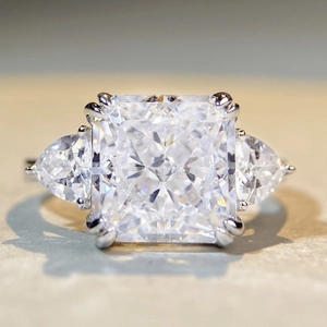 Classic S925 sterling silver ring with large radiant cut zircon and pear side stones