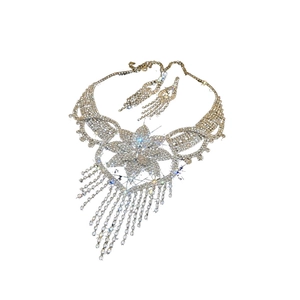 Luxurious silver floral necklace and earrings set with tassels and sparkling rhinestones