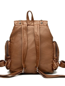 Brown rivet washed leather backpack with large capacity and lychee grain texture back view