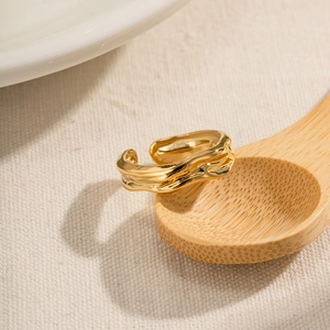 18k gold plated irregular wavy snake ring with a textured metallic finish for women