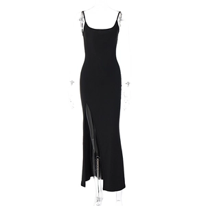 Close-up of black lace mesh backless dress with a high side slit and slim fit design