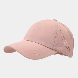 Detailed side view of pink breathable baseball cap with laser-cut ventilation holes