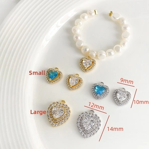 Détails de breloques cœur en plaqué or 18k avec zircon et bracelet en perles assorti