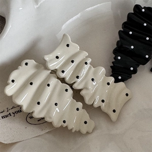 French vintage wavy polka dot hair clips in black and cream resin finish set