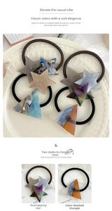 Cute star and triangle acetate hair ties in blue and brown on an elegant white plate