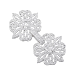 Close-up of silver hollow floral jewelry clasps with cubic zirconia for DIY necklaces
