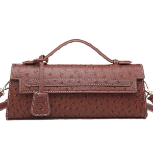 Brown ostrich texture faux leather baguette shoulder bag with metallic buckle closure