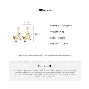 Detail showing cartoon puppy earrings specs with copper and zircon material info