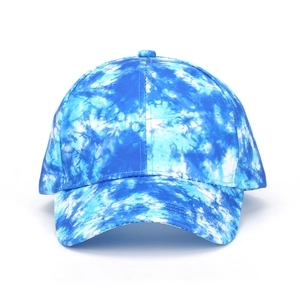 Close-up of blue and white tie-dye patterns on a cotton baseball cap for outdoor leisure