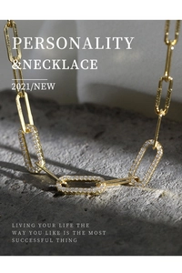 Close-up of 925 silver paperclip chain necklace with sparkling pave cubic zirconia links