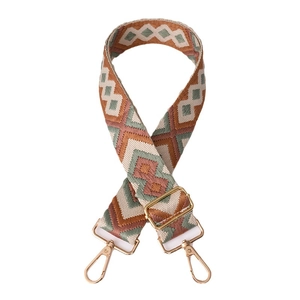 Ethnic geometric pattern bag strap with adjustable length and gold metal hooks