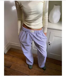 Women's lavender high-waisted corduroy wide-leg trousers with elastic waistband