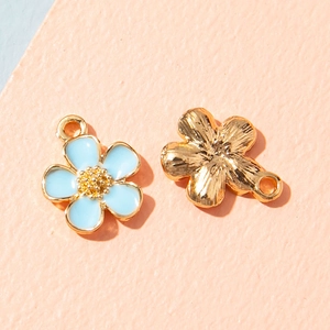 Floral alloy pendants with light blue enamel and golden finish for DIY jewelry