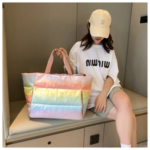Detailed view of spacious rainbow quilted fitness bag with waterproof nylon texture
