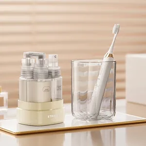 Portable 35ml travel pump bottles for serum and lotion with a multi-use storage base cup