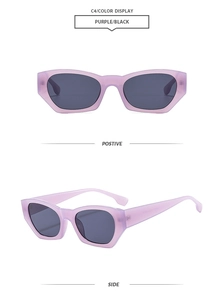Detail view of stylish translucent purple cat-eye sunglasses with dark grey lenses