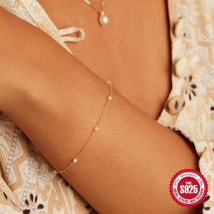 Elegante pulsera de plata de ley S925 con cadena dorada y cinco perlas redondas mujer