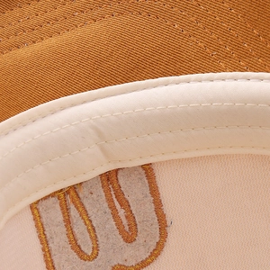 Close-up of internal sweatband and fine embroidery on the cotton baseball cap
