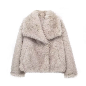Detailed close-up of grey beige faux fur coat featuring a soft texture and wide lapels