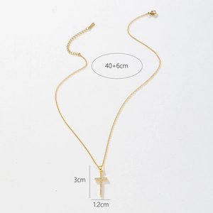 Detail shot of gold cross necklace showing 3cm pendant height and 40+6cm chain length