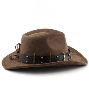 Detail of brown faux suede cowboy hat featuring leather band and metal bullet accents